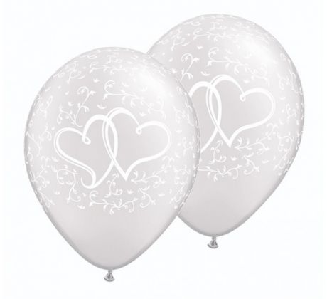 Kvalitné latexové balóniky v metalickej perleťovej farbe s bielou potlačou spojených sŕdc  sú ideálne na doplnenie svadobnej výzdoby. Nezabudnite na pekné ťažitka.